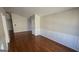 Dining room with hardwood floors, panel molding, and natural light at 1006 Harbor View Ln, Mcdonough, GA 30252