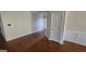 Dining room with hardwood floors and modern panel molding at 1006 Harbor View Ln, Mcdonough, GA 30252