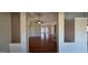 Bright entryway with hardwood floors leading into a spacious living room at 1006 Harbor View Ln, Mcdonough, GA 30252