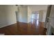 Bright open living space with hardwood floors and fireplace at 1006 Harbor View Ln, Mcdonough, GA 30252