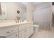 Traditional bathroom featuring a vanity, framed mirror, and a bathtub with a curtain at 1191 Rawlings Dr, Rutledge, GA 30663