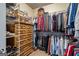 Well-organized walk-in closet with shelving, hanging rods, and ample storage space at 1191 Rawlings Dr, Rutledge, GA 30663