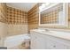 Bathroom featuring tiled shower, toilet, vanity with white counter at 131 Heron Dr, Riverdale, GA 30274