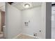 Small laundry room with washer and dryer hookups at 131 Heron Dr, Riverdale, GA 30274