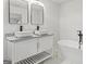 Bright bathroom featuring double sink vanity, vessel sinks, and modern fixtures at 1077 Peeples Sw St, Atlanta, GA 30310
