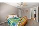 Bedroom featuring ceiling fan, plush carpet, and natural light at 707 Orleans Trce, Peachtree City, GA 30269