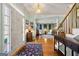 Welcoming foyer with hardwood floors and staircase leading to the upper level at 707 Orleans Trce, Peachtree City, GA 30269