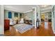 Inviting living room with hardwood floors, designer rug, and comfortable seating; a calming aesthetic at 707 Orleans Trce, Peachtree City, GA 30269