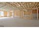 Unfinished basement with wooden framing and visible ceiling insulation ready for customization to suit any need at 135 Red Maple Dr, Peachtree City, GA 30269