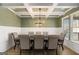 Elegant dining room with coffered ceilings and stylish decor at 157 Donovan Ave, Locust Grove, GA 30248