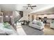 Spacious living room with open floor plan to kitchen and staircase at 157 Donovan Ave, Locust Grove, GA 30248