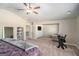 Spacious main bedroom with vaulted ceilings and an adjoined living space at 157 Donovan Ave, Locust Grove, GA 30248