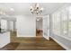 Breakfast area off of kitchen offers bright natural light from windows with shutters at 1160 Strath Clyde Way, Mcdonough, GA 30253