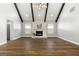 Spacious living room features a fireplace, hardwood floors, and vaulted ceilings at 1160 Strath Clyde Way, Mcdonough, GA 30253