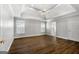 Spacious main bedroom with tray ceilings, fan and an ensuite bathroom at 1160 Strath Clyde Way, Mcdonough, GA 30253