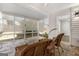 Sun room with tiled floors, wicker furniture, and a screened-in exterior at 1160 Strath Clyde Way, Mcdonough, GA 30253