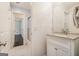 Hall bathroom with white vanity and shower-tub combination at 2050 Federal Rd, Roswell, GA 30075