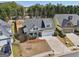 Aerial view of a home in a suburban neighborhood, with mature trees surrounding the property at 252 Turnbridge Cir, Peachtree City, GA 30269