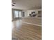 Open kitchen space with a peninsula, bright white cabinets, stainless appliances, and breakfast area at 2260 Burdett Ridge Dr, South Fulton, GA 30349