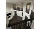 Open-concept living room view from above with fireplace at 829 Artistry Way, Fairburn, GA 30213