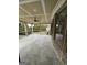 Covered patio with ceiling fan and brick exterior at 829 Artistry Way, Fairburn, GA 30213