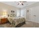 Comfortable bedroom with floral bedding, creating a welcoming atmosphere at 101 Dean Cir, Mcdonough, GA 30253