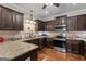 Modern kitchen featuring granite counters, stainless appliances and ample counter space at 101 Dean Cir, Mcdonough, GA 30253