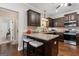 Stylish kitchen with granite countertops, stainless steel appliances, and dark cabinetry at 101 Dean Cir, Mcdonough, GA 30253