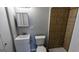 Clean bathroom with a modern vanity, tile flooring and a tiled shower at 4214 Canby Ln, Decatur, GA 30035