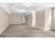 Spacious bonus room featuring plush carpet, neutral walls, and ample space at 1283 Heritage Dr, Villa Rica, GA 30180