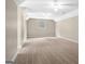 Large bonus room features neutral carpet, neutral paint, and recessed lighting at 1283 Heritage Dr, Villa Rica, GA 30180