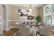 Staged dining room showcasing modern decor, a round table, and stylish chairs at 1283 Heritage Dr, Villa Rica, GA 30180