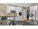 Modern kitchen with stainless steel appliances, granite countertops, and white cabinetry at 1283 Heritage Dr, Villa Rica, GA 30180