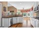 Open kitchen features stainless steel appliances, granite counters and an eat-in nook at 1283 Heritage Dr, Villa Rica, GA 30180