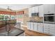 Kitchen with granite countertops, stainless steel appliances, and eat-in nook at 1283 Heritage Dr, Villa Rica, GA 30180