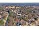 Stunning aerial view of a residential area near a beautiful golf course at 210 Steeple Point Dr, Roswell, GA 30076