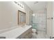 Modern bathroom featuring marble floors, a glass shower, and a sleek vanity at 210 Steeple Point Dr, Roswell, GA 30076