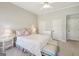 Spacious bedroom with neutral walls, plush carpeting, and charming pink accents at 210 Steeple Point Dr, Roswell, GA 30076