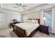 Large bedroom featuring a work station and a spacious bed at 210 Steeple Point Dr, Roswell, GA 30076