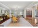 Traditional dining room with chandelier and hardwood floors at 210 Steeple Point Dr, Roswell, GA 30076
