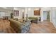 Inviting living room boasts hardwood floors and a luxurious seating arrangement at 210 Steeple Point Dr, Roswell, GA 30076