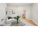 Cozy living room featuring modern furniture, a stylish coffee table, and artwork for a comfortable space at 210 Steeple Point Dr, Roswell, GA 30076