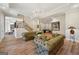 Open-concept living room with a staircase, hardwood floors and neutral decor at 210 Steeple Point Dr, Roswell, GA 30076