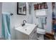 Bathroom featuring a vanity and toilet, offering a clean and functional space for everyday needs at 10174 Twin Oaks Sw Dr, Covington, GA 30014
