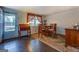Bright dining area with hardwood floors and natural light from large windows at 10174 Twin Oaks Sw Dr, Covington, GA 30014