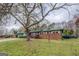 Charming single-story brick home with a well-manicured front yard at 10174 Twin Oaks Sw Dr, Covington, GA 30014