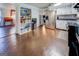 Bright kitchen features stainless steel appliances, open shelving, and ample cabinet space at 10174 Twin Oaks Sw Dr, Covington, GA 30014
