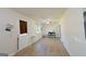 Bright living room featuring wood-look floors and a ceiling fan at 97 College St, Temple, GA 30179