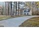Beautiful home with a long drive way surrounded by mature trees providing a secluded feel at 215 Farr Lake Dr, Tyrone, GA 30290