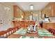 View of the kitchen and breakfast nook, featuring wood cabinets and stainless steel appliances at 215 Farr Lake Dr, Tyrone, GA 30290